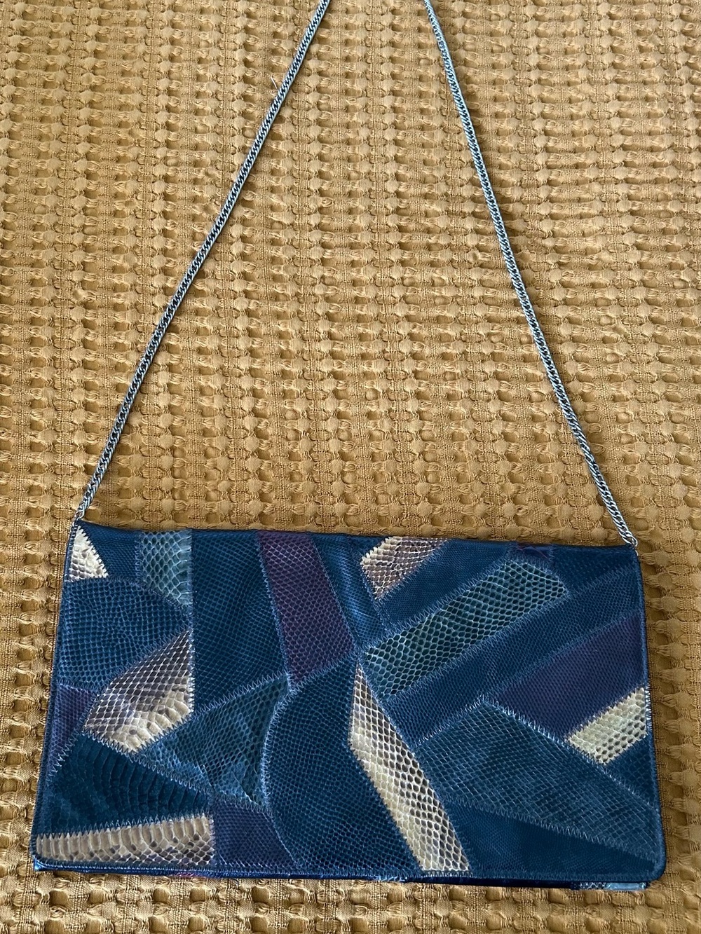 Vintage 1970s “Bags by Varon” convertible patchwork snakeskin clutch.